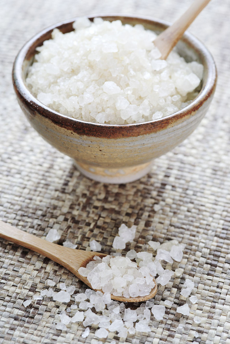 Bath/spa salts in bowl with wooden spoon
